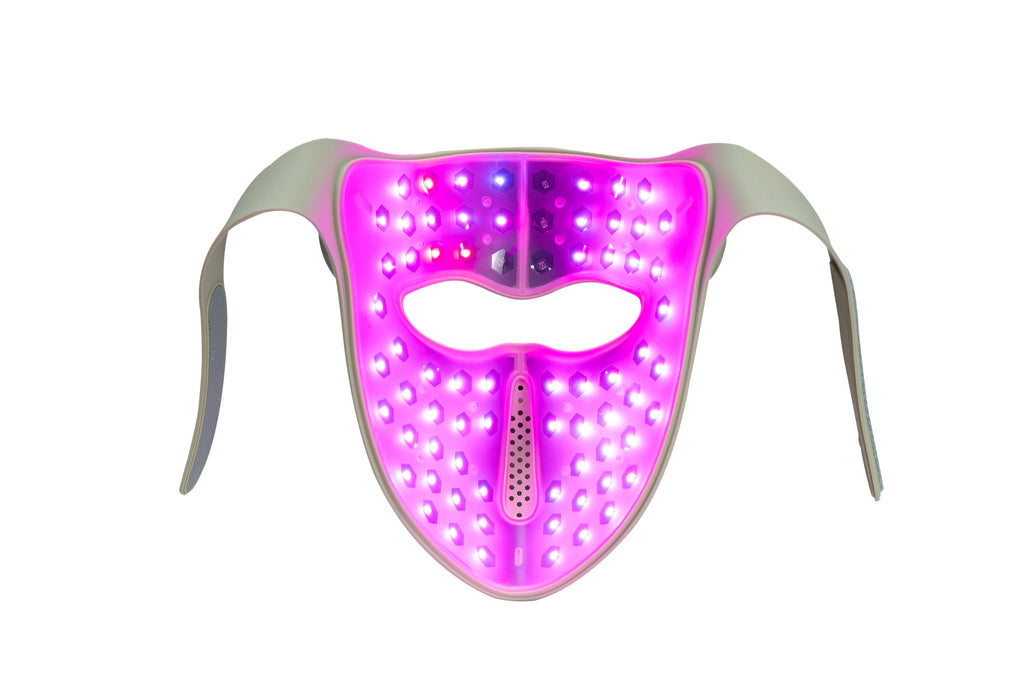 Red Light Therapy Face Mask, flat lay, pink LED mode active